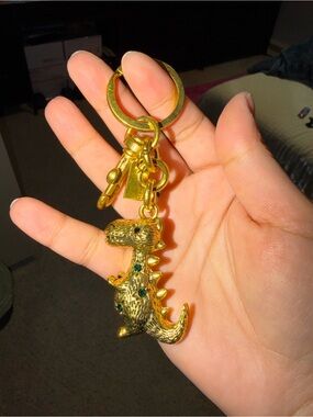 Coach Gold Dinosaur Charm Keychain with Green Accents